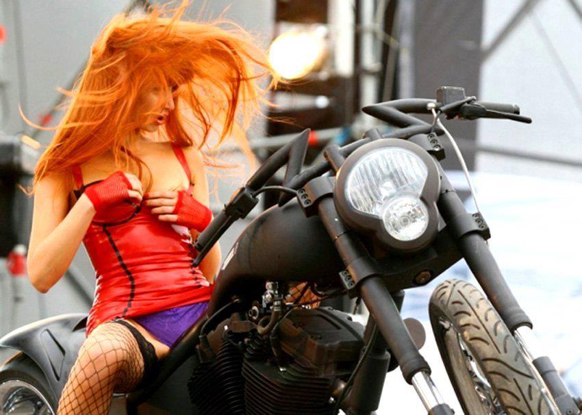 redhead on motocycle