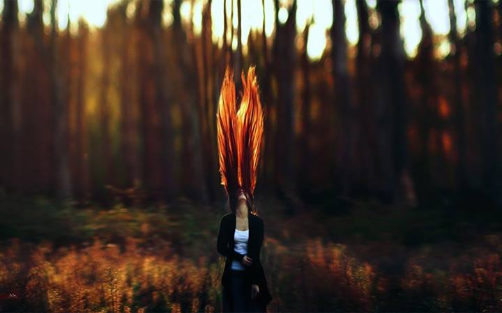 redhead has wings