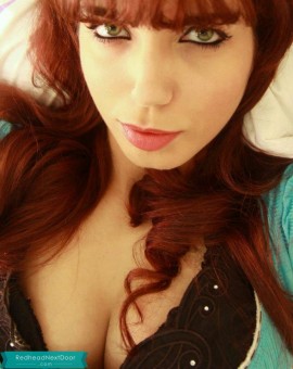 Beautiful redhead with green eyes