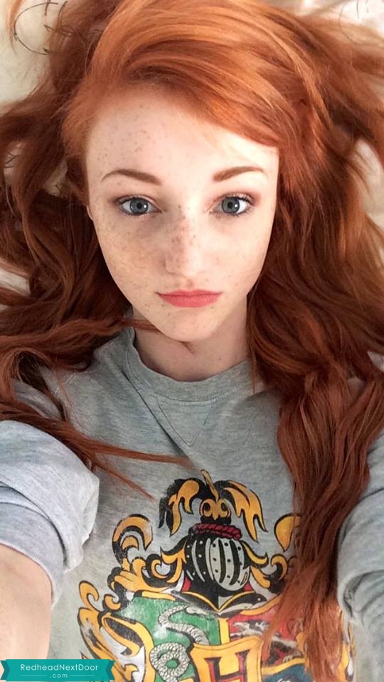 Close up shot of cute redhead teenage girl with perfect 